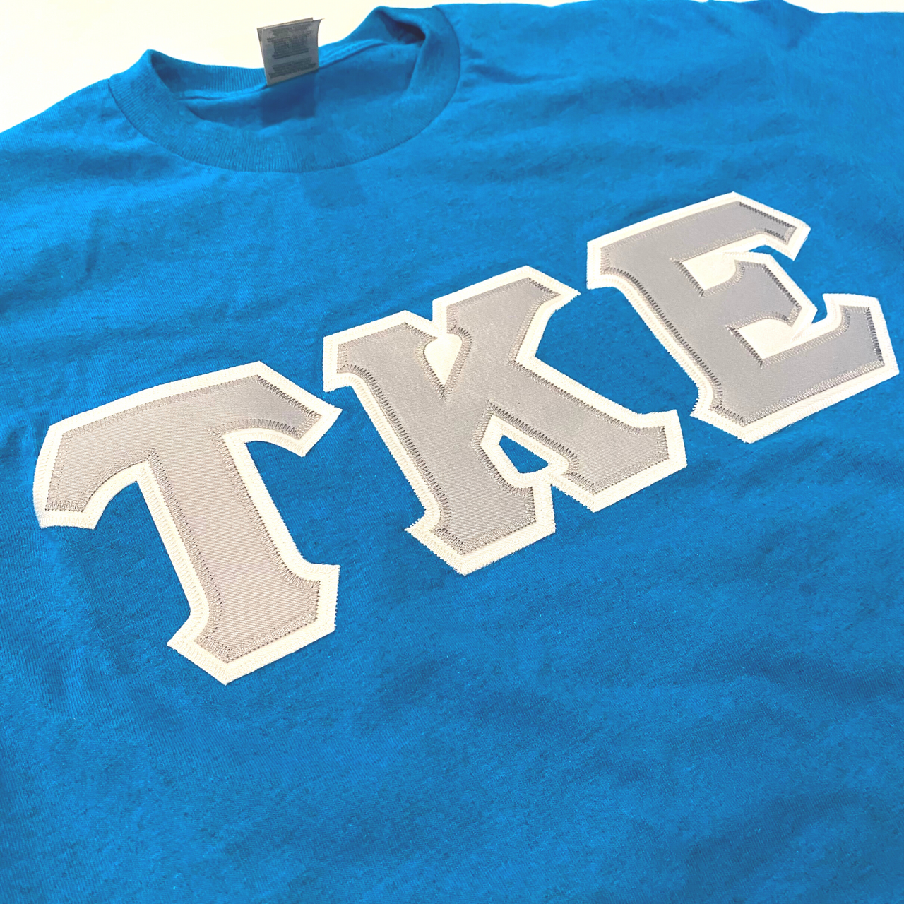 Tau Kappa Epsilon Stitched Letter T-Shirt | Sapphire | Gray with White Border