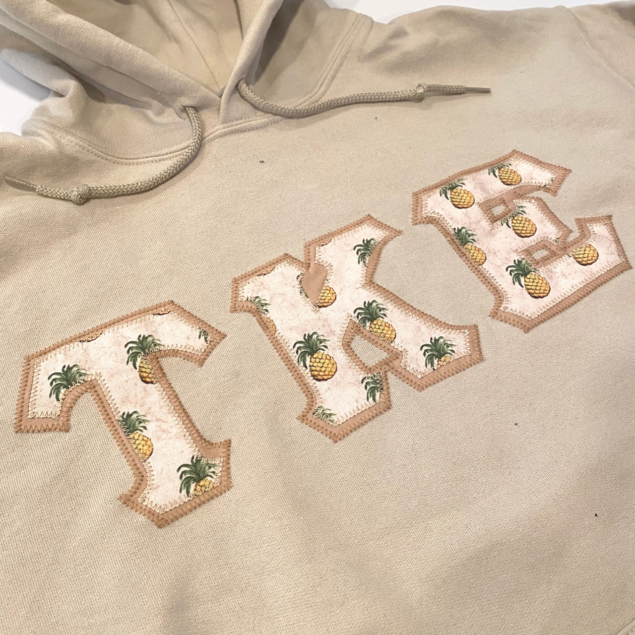Tau Kappa Epsilon Stitched Letter Hoodie | Pineapples with Tan Border