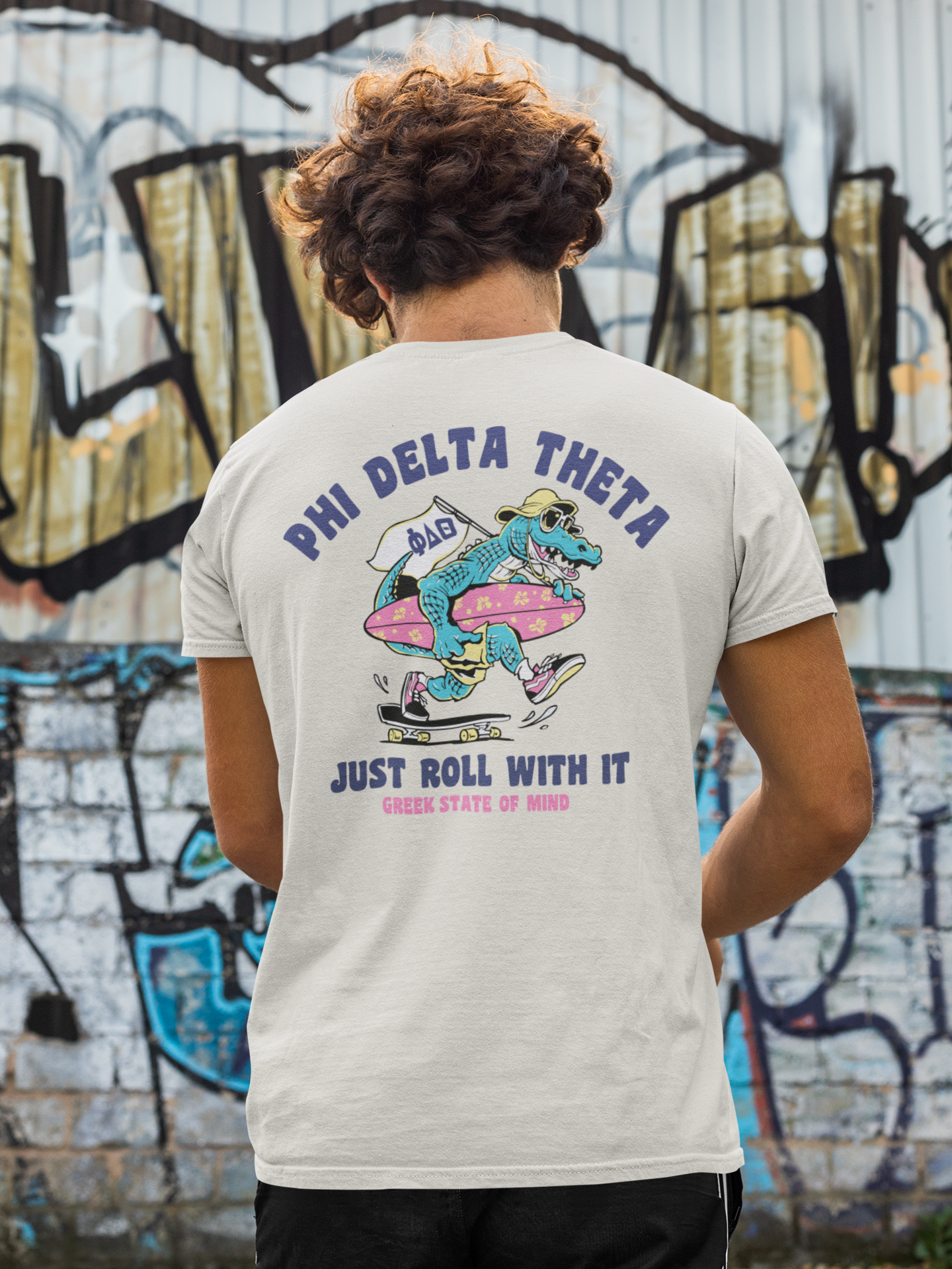 white Phi Delta Theta Graphic T-Shirt | Alligator Skater | phi delta theta fraternity greek apparel model 