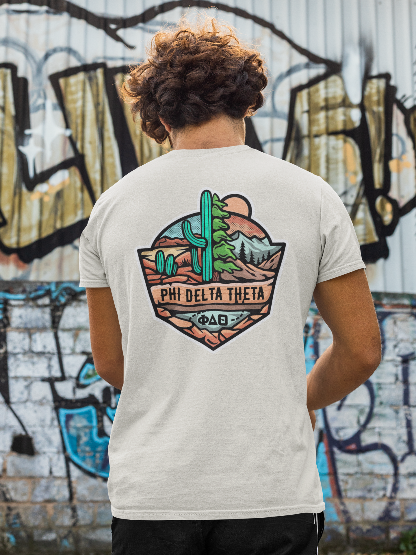 white Phi Delta Theta Graphic T-Shirt | Desert Mountains | phi delta theta fraternity greek apparel model 
