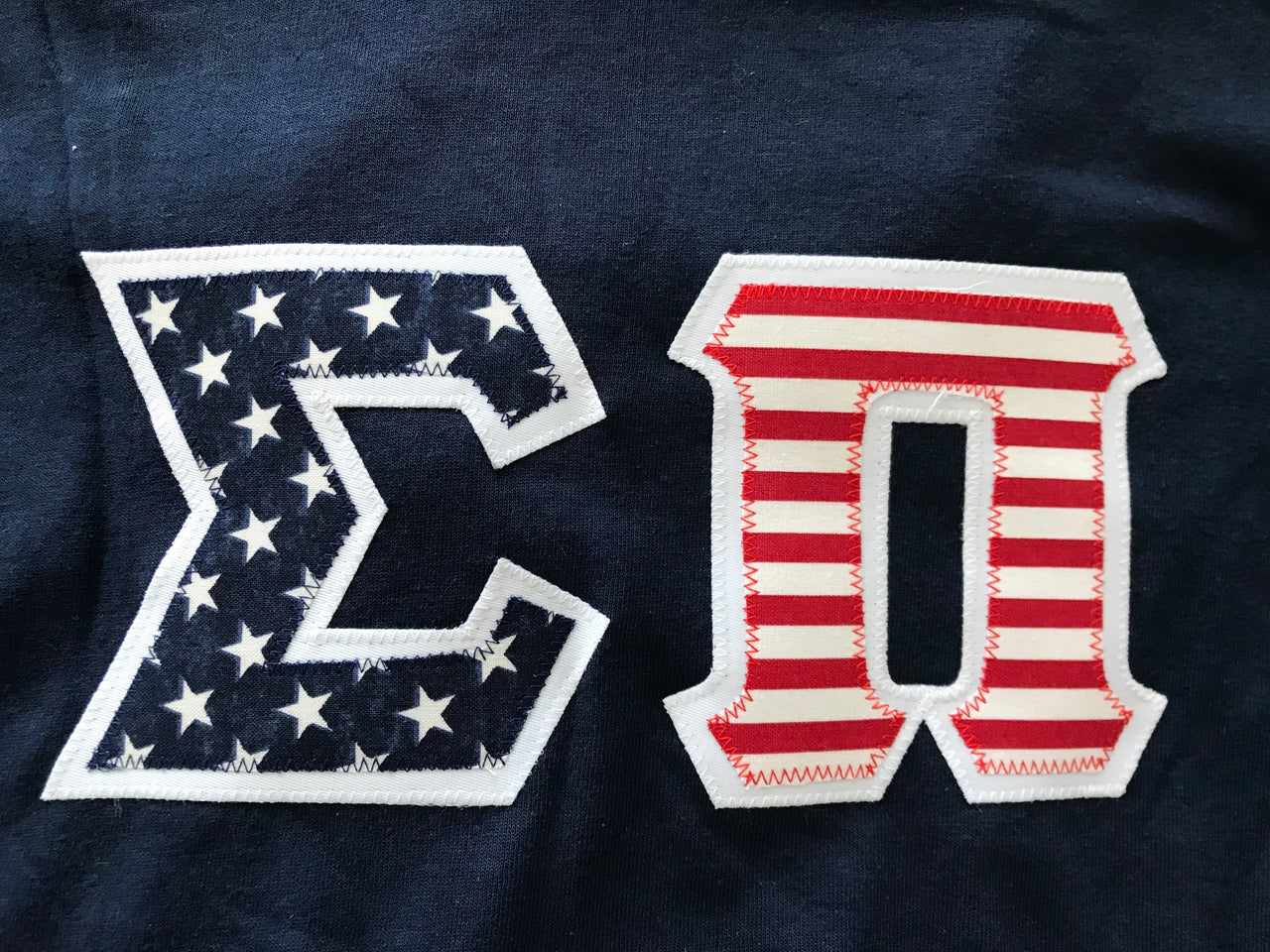 Sigma Pi Stitched Letter T-Shirt | American Flag Pattern