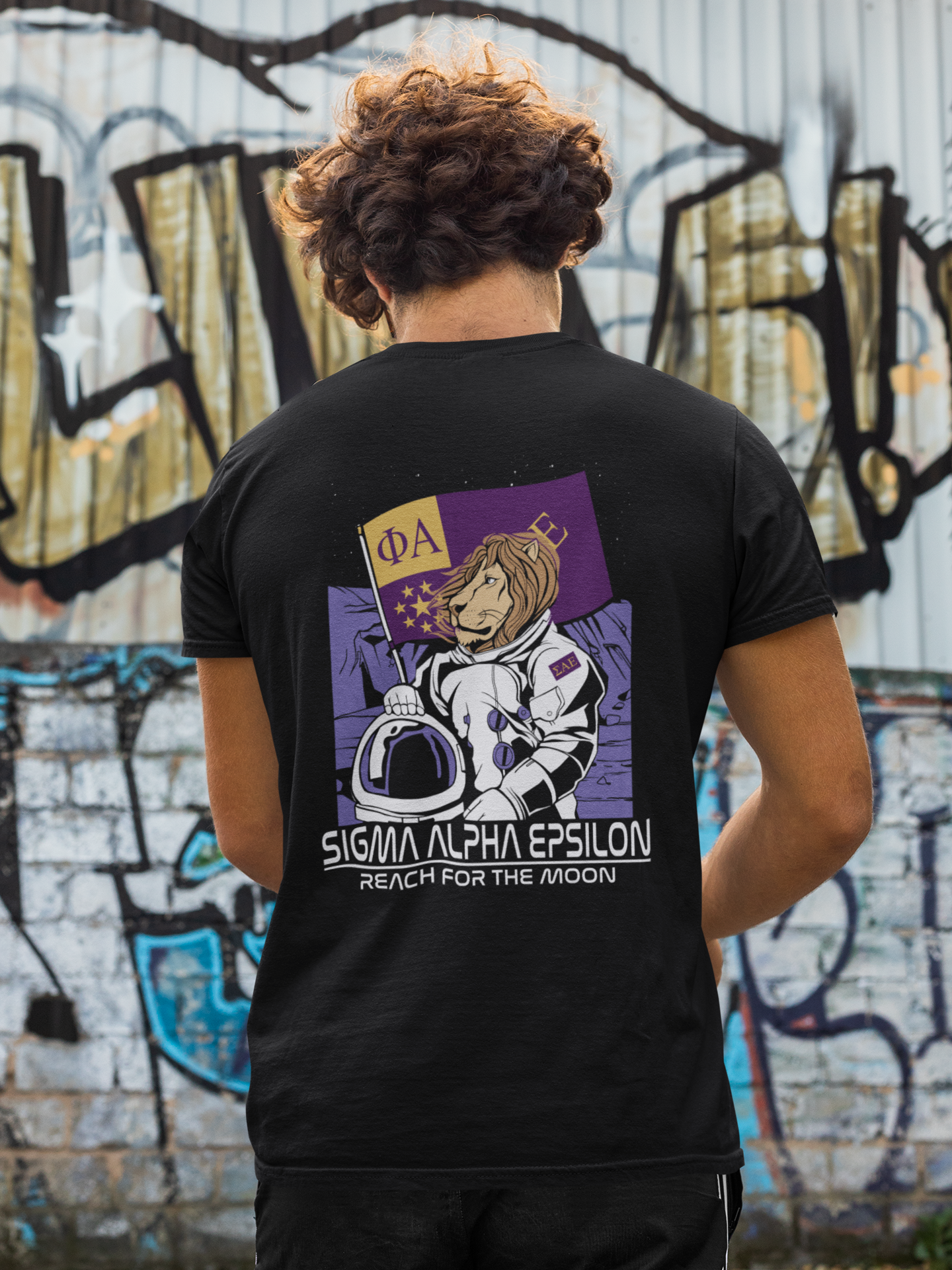 Sigma Alpha Epsilon | Space Lion Graphic T-Shirt | Sigma Alpha Epsilon Clothing and Merchandise model 