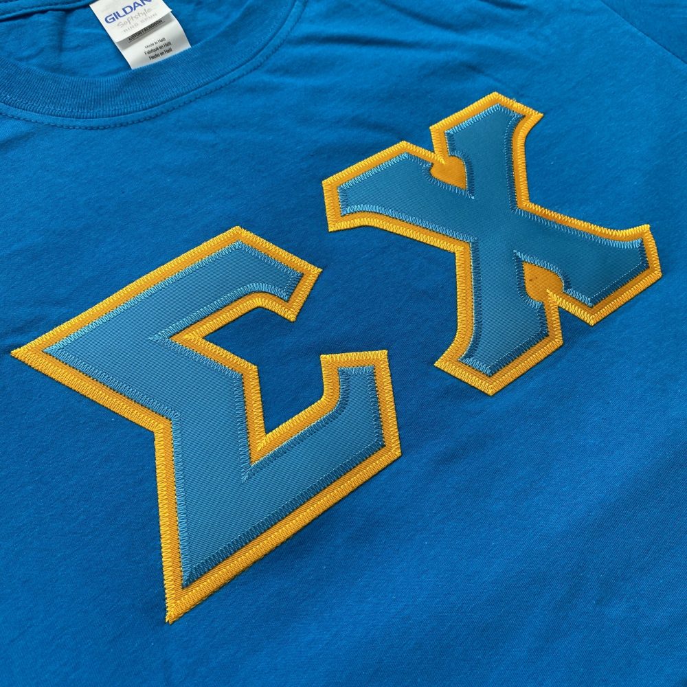 Sigma Chi Stitched Letter T-Shirt | Sapphire | Cyan with Gold Border